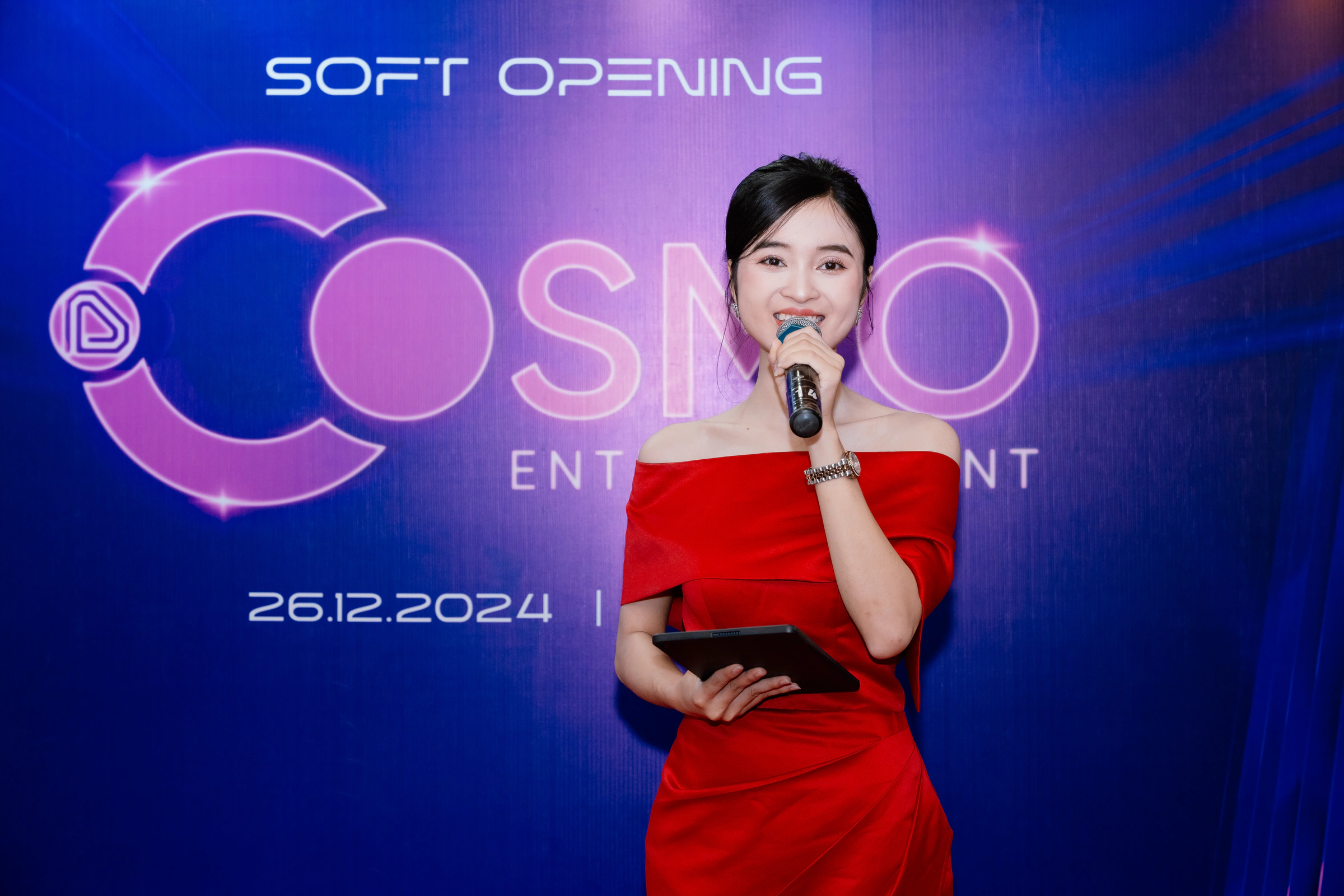 Cosmo Entertainment host on backdrop