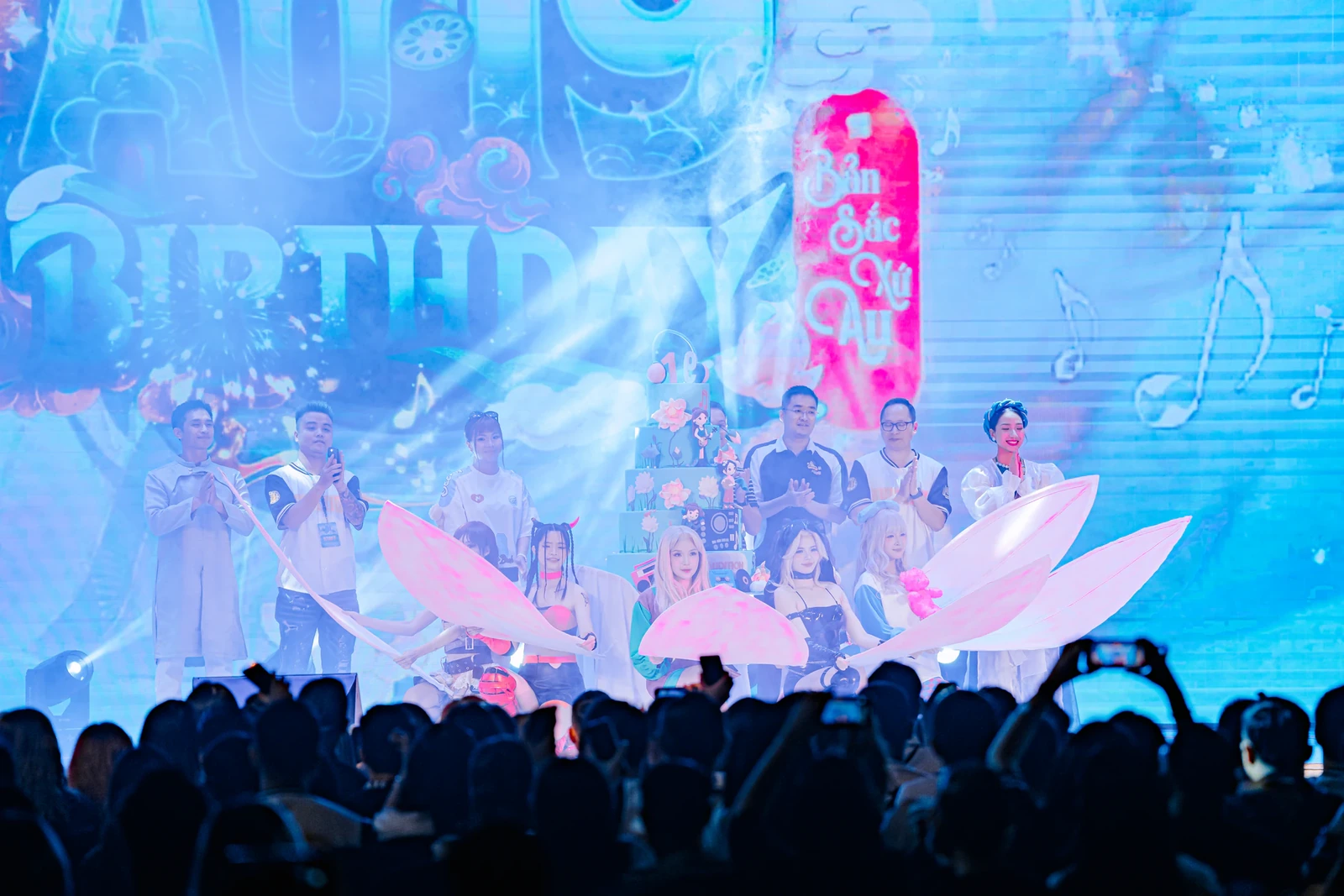 Guests and players celebrating Audition's 19th birthday on stage
