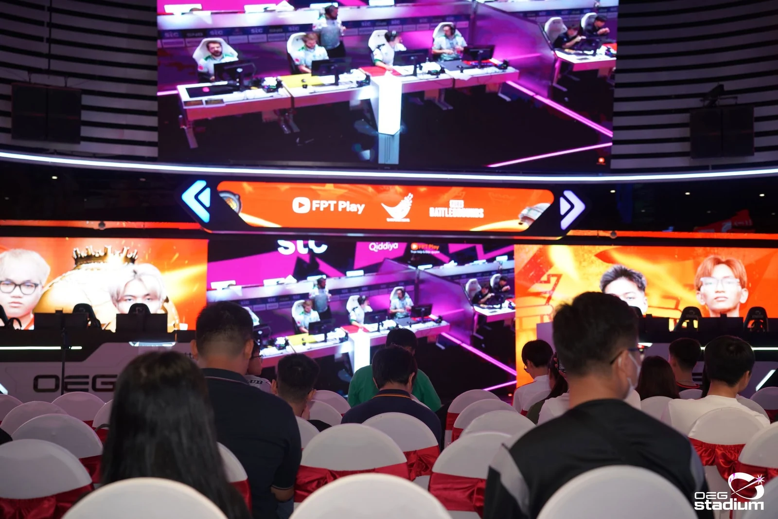 Fans watching PUBG EWC 2025 on the big screen at OEG Stadium